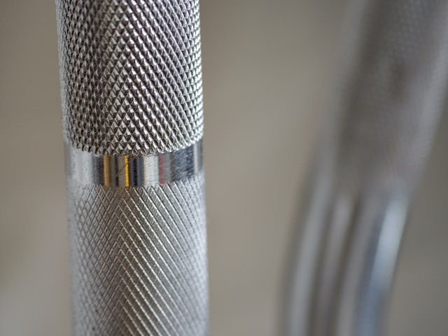 silver-and-gold-microphone-on-white-table